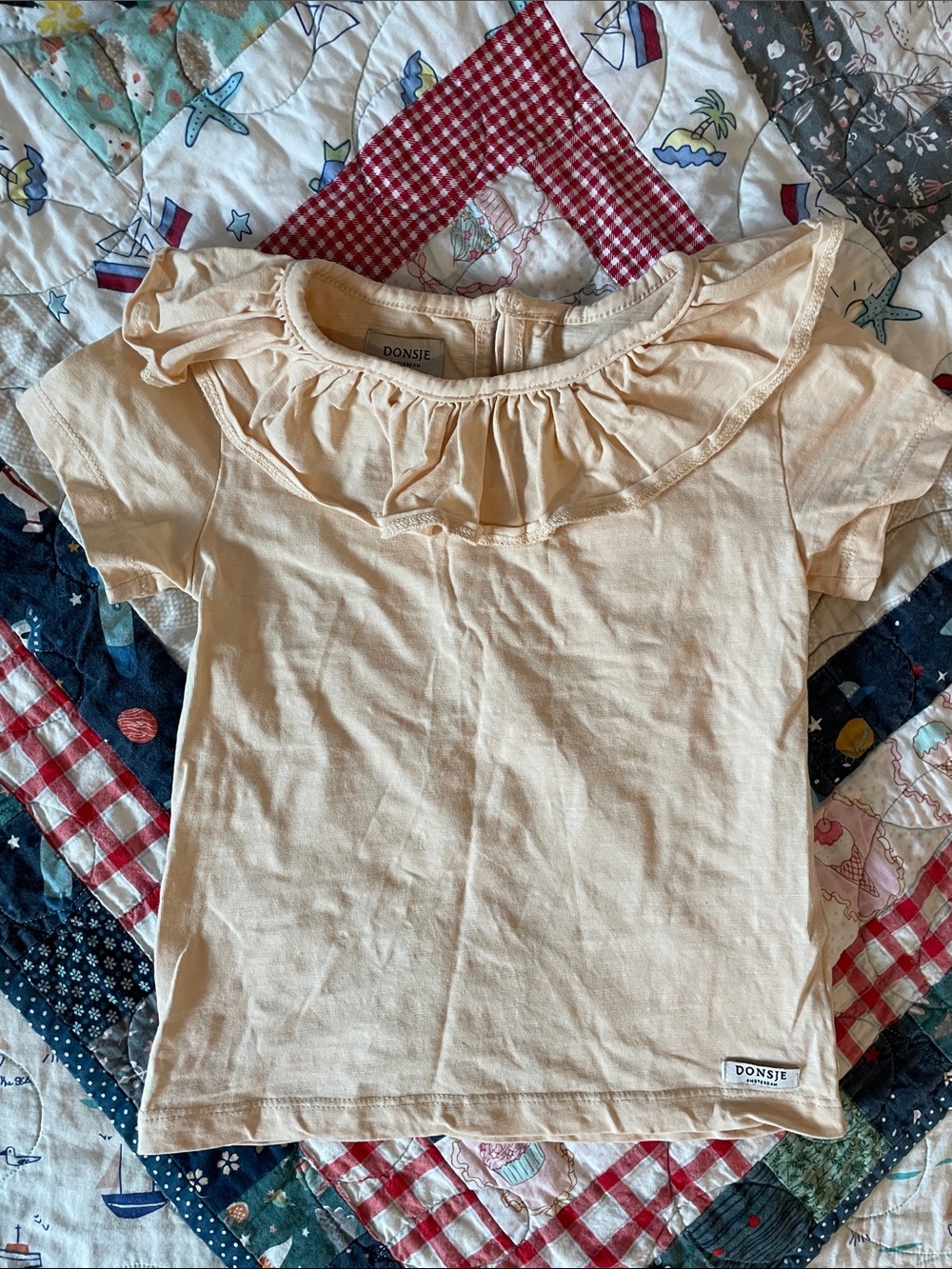 Donsje Girls' Cream Ruffle Neck Short Sleeve Tee